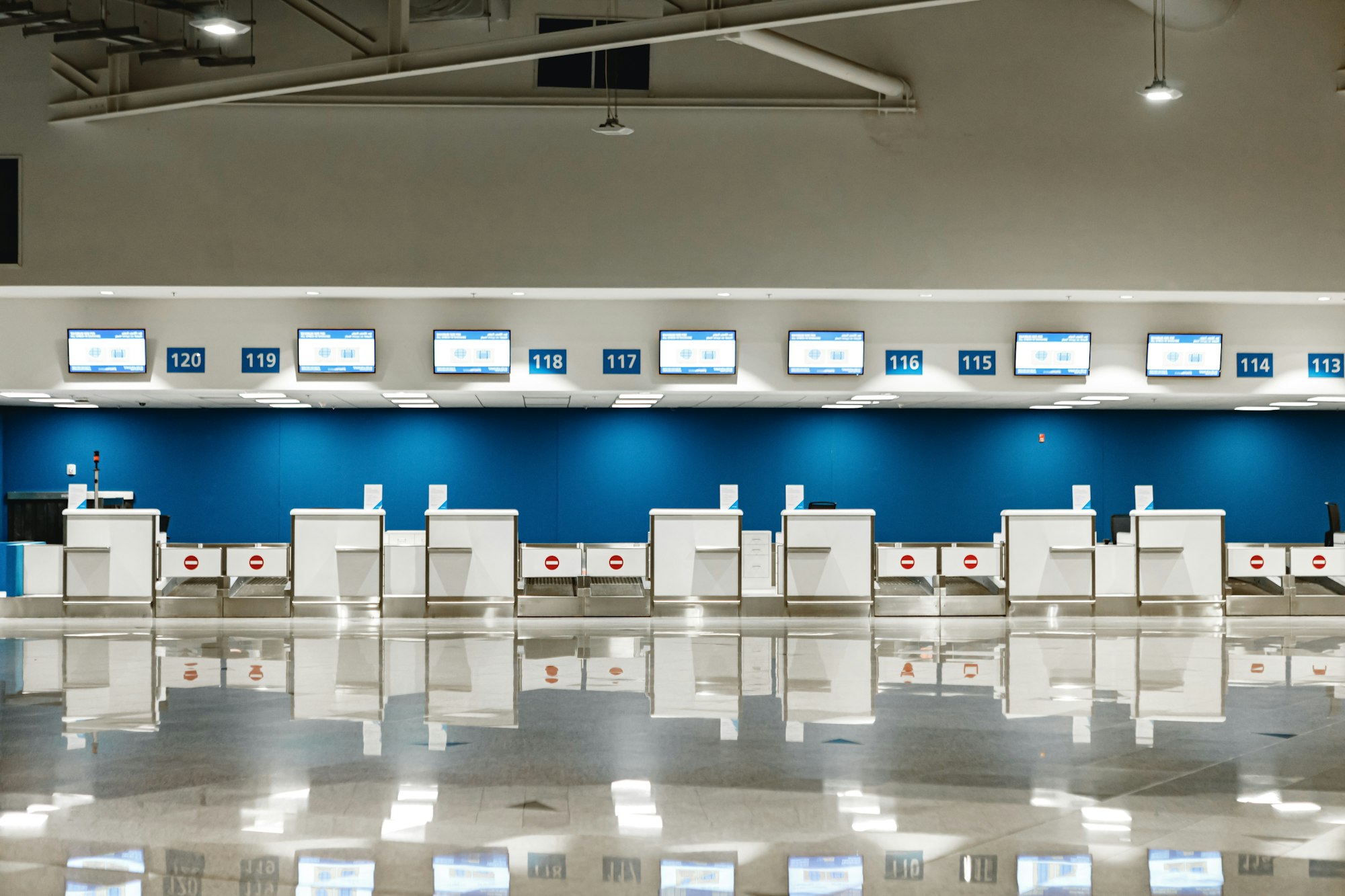 Airport check-in counters for background, no people