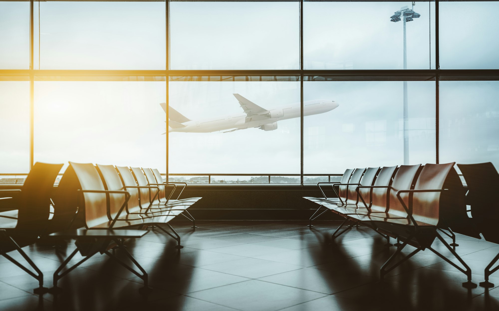 Waiting hall of airport and airplane